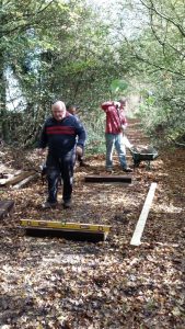 Volunteers carrying out work on the boardwalk